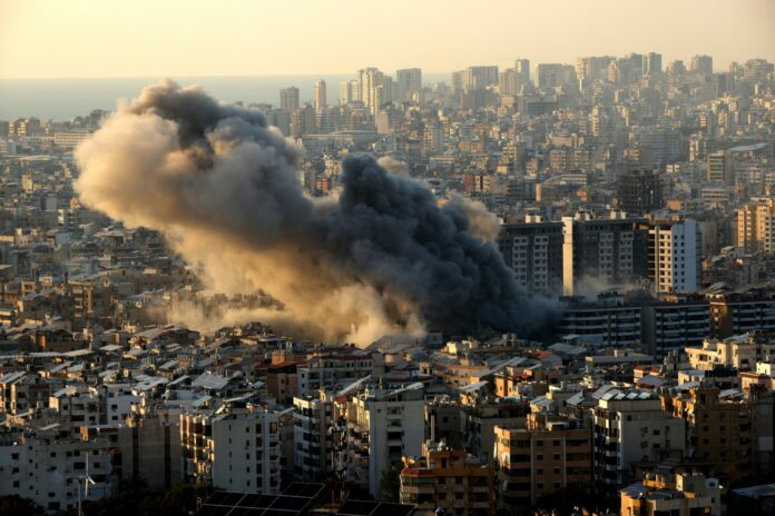 Smoke rises from the site of an Israeli airstrike that targeted an area in Beirut's southern suburbs on March 10, 2026. (Photo by Ibrahim AMRO / AFP)