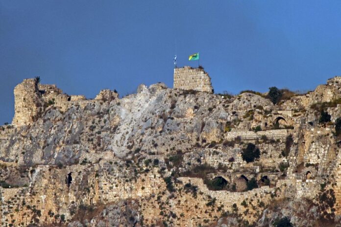 


This photograph, taken in Marjayoun, southern Lebanon, shows Israeli flags flying over the medieval Beaufort Castle, locally known as Qalaat al-Shaqif, near the village of Arnoun, struck by an Israeli attack on June 3, 2026. (Credit: AFP)